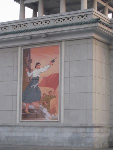 One of the grand theatre is adorned with this mural of a peasant who is packing.